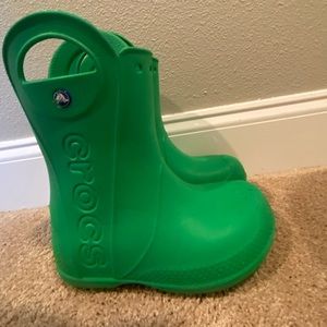 Kids green rain boots by Crocs. Just like new. Size 1